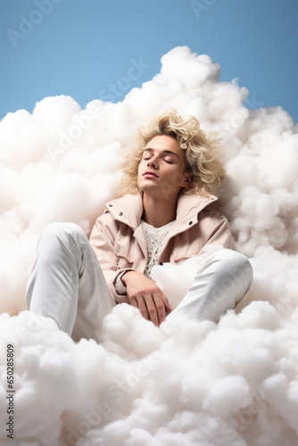 Surreal artist laying on a fluffy cloud isolated on a white background 