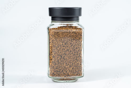 Instant coffee powder against a white background