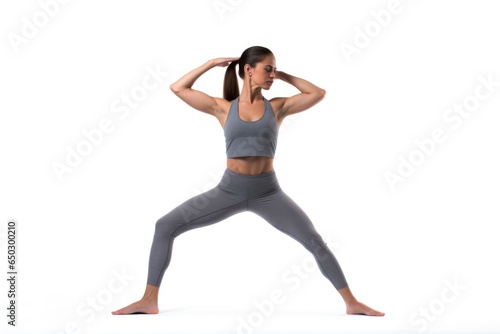 woman doing yoga on white background © Anatolii