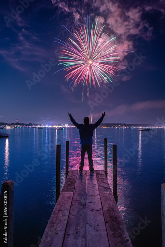 Man Watching Fireworks Hands In Air