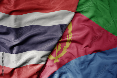 big waving national colorful flag of thailand and national flag of eritrea . © luzitanija