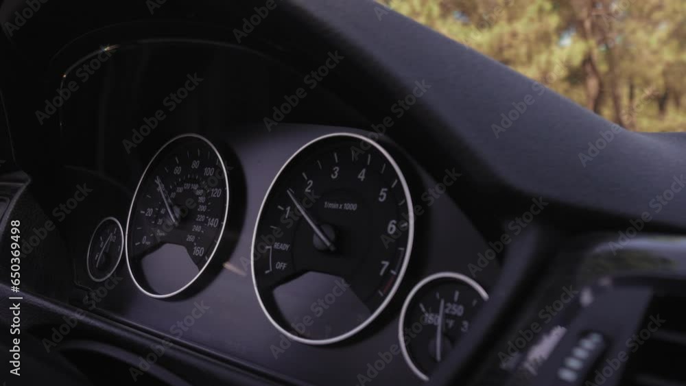 Movement of car at night at high speed view from interior with driver ...