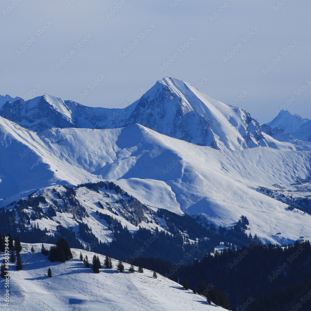 Snow covered mountains seen from the Horneggli ski area, Switzerland.