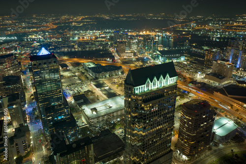 Aerial view of downtown district of Tampa city in Florida, USA. Brightly illuminated high skyscraper buildings in modern american midtown photo
