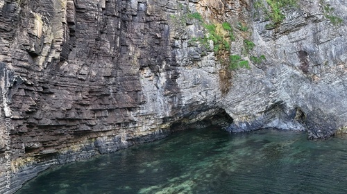 Crystal clear water of a rocky bay in Caithness, Scotland photo