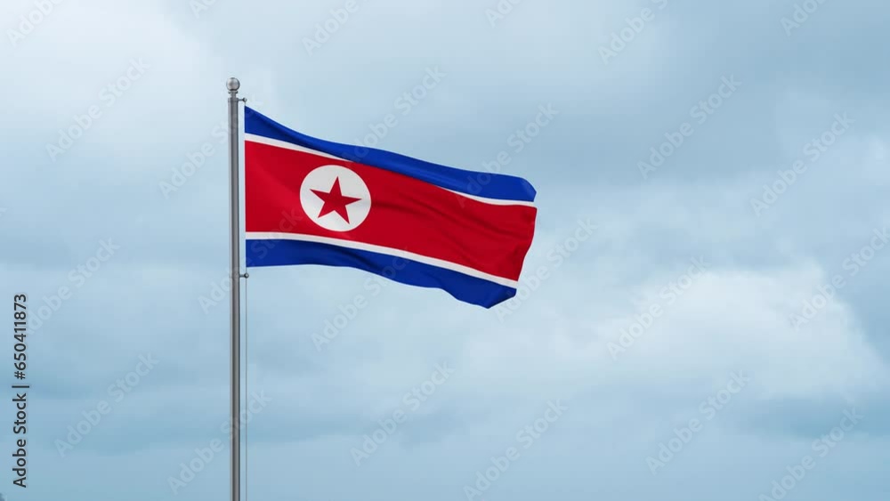 North Korea flag waving in the wind, cloudy blue sky with running clouds, endless seamless loop North Korea flag waving in the wind, cloudy blue sky with running clouds, endless seamless loop
