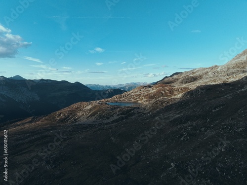 Aerial view of a lake in mountains of Graubunden, Switzerland photo