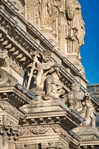 Series of sculptures adorning an old building in Paris, France