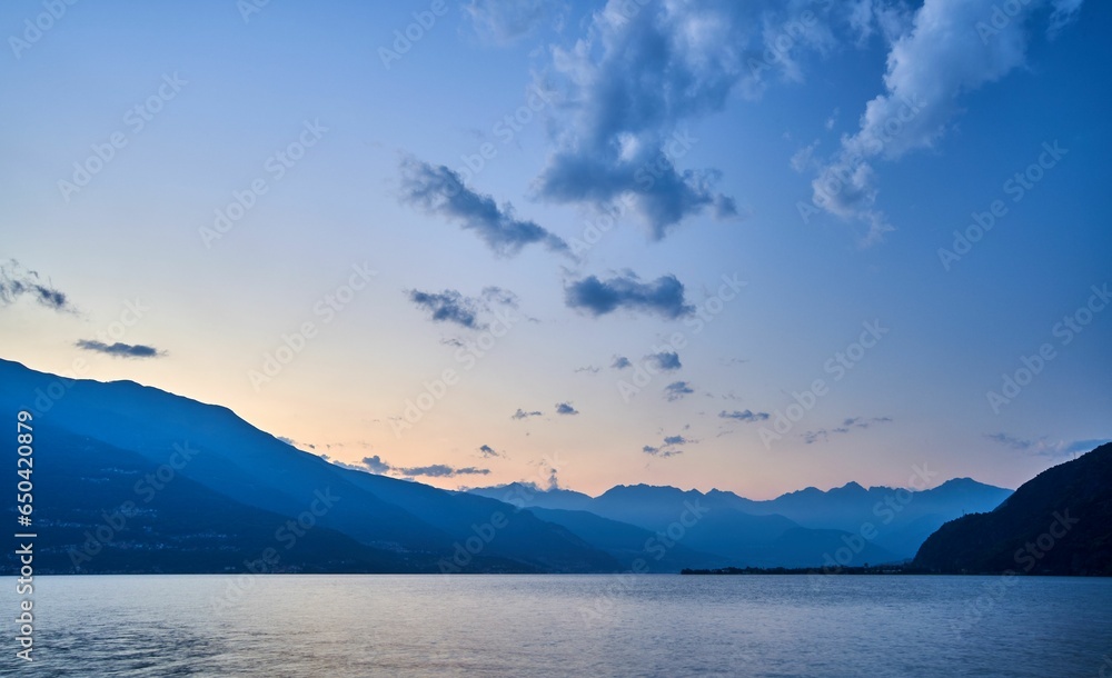 Beautiful shot of a sunset sky over Lake Como and nearby mountains