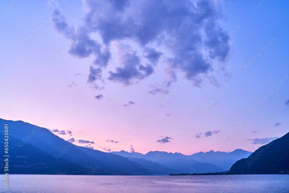 Beautiful shot of a sunset sky over Lake Como and nearby mountains