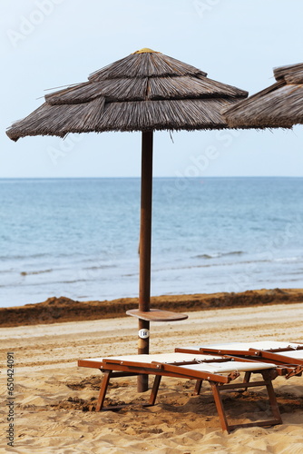 sun umbrella and beach charis photo