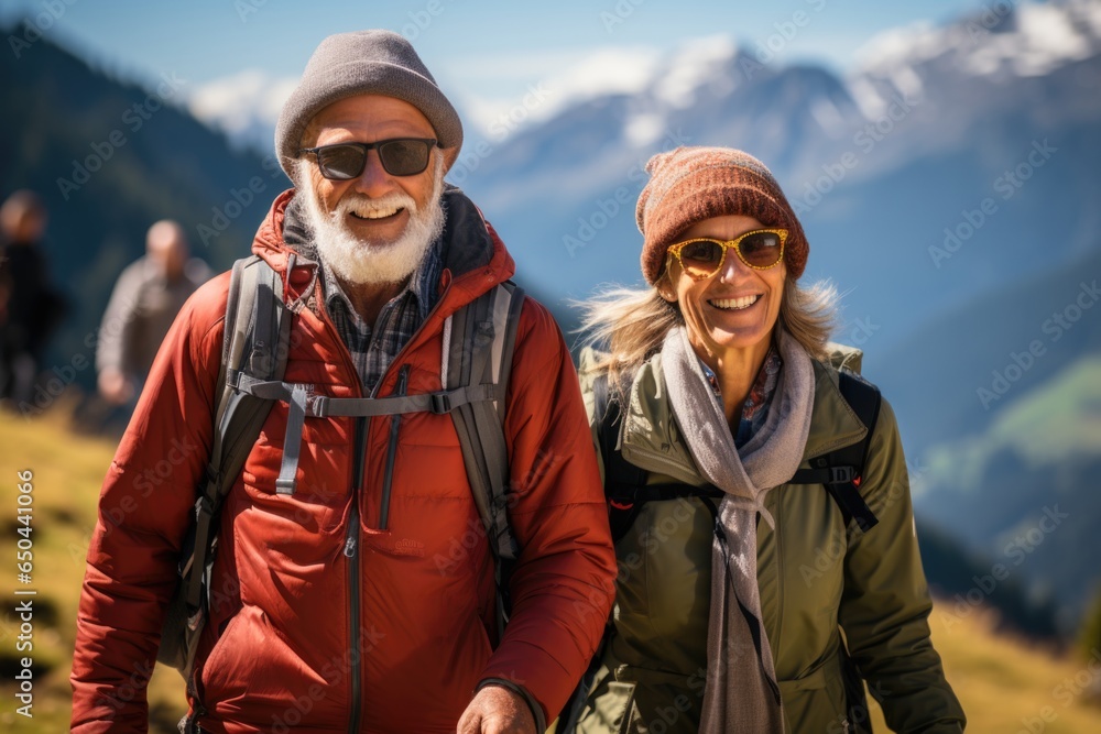 Smiling couple enjoying winter adventure in mountain landscape Smiling couple enjoying winter adventure in mountain landscape