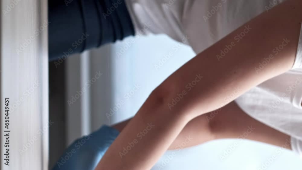 Vertical video. Furniture hygiene. Dust removing. Woman housewife hands in protective gloves cleaning table surface with blue microfiber cloth. Vertical video. Furniture hygiene. Dust removing. Woman housewife hands in protective gloves cleaning table surface with blue microfiber cloth.