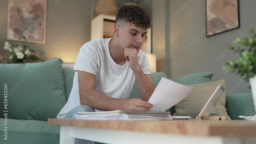 Young caucasian man teenager student study at home Young caucasian man teenager student study at home