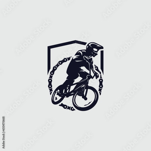Cycling vector image.cycling bmx logo.biker jumping doing acrobatic tricks atraction ilustration. photo