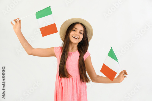 Little girl with flags of I...