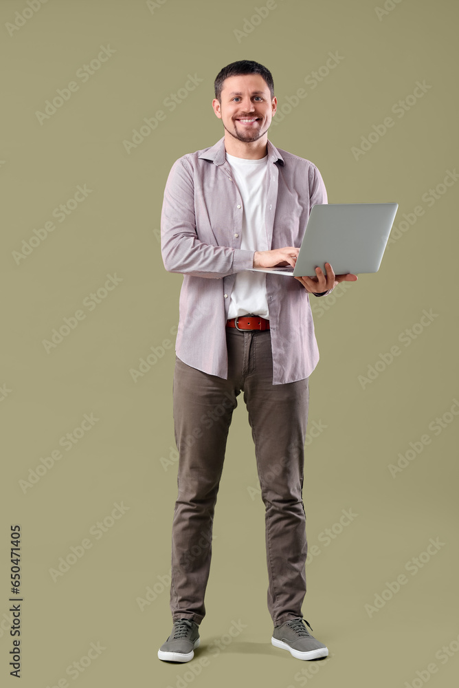 Man with laptop on color background Man with laptop on color background