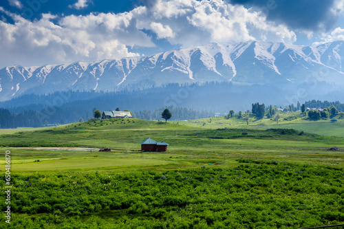 Landscape with mountains and clouds. Panorama of the mountains. Beautiful scenic Mountain Landscape Of Gulmarg Jammu And Kashmir State India 