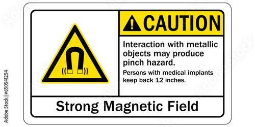 Magnetic field and pacemaker warning sign and labels Interaction with metallic objects may produce pinch hazard. Persons with medical implants keep back 12 inches. Strong magnetic field