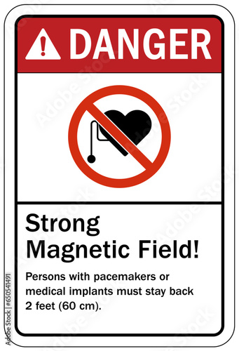 Magnetic field and pacemaker warning sign and labels strong magnetic field. Person with pacemakers or medical implants must stay back 2 feet (60 cm)