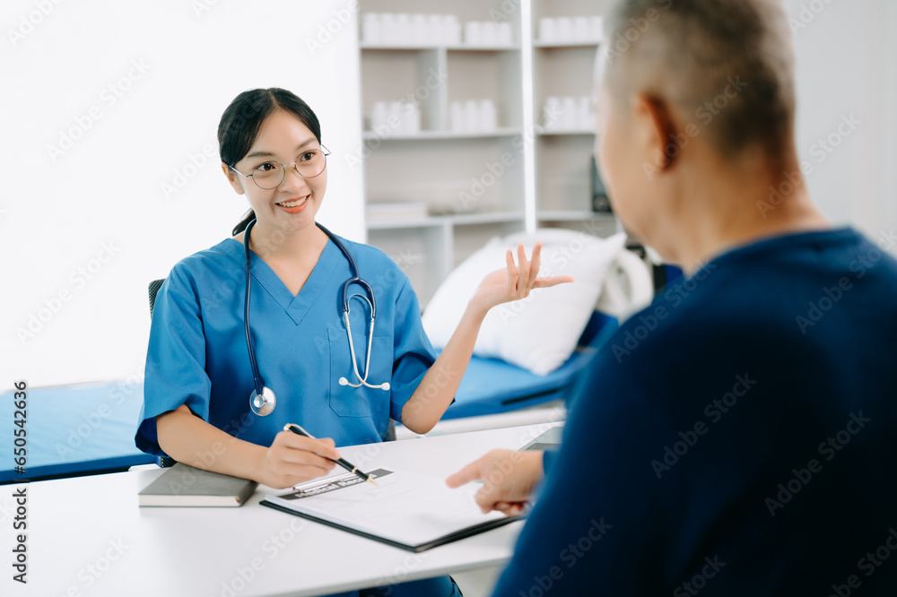 Serious Asia female doctor using clipboard is delivering great news talk discuss results or symptoms with female patient in clinic or hospital . Serious Asia female doctor using clipboard is delivering great news talk discuss results or symptoms with female patient in clinic or hospital .