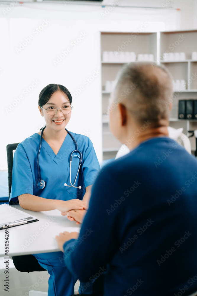 Serious Asia female doctor using clipboard is delivering great news talk discuss results or symptoms with female patient in clinic or hospital .
