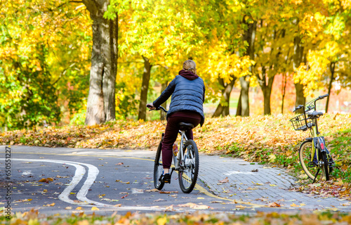 Cyclist ride on the bike path in the city Park 