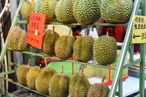 Many durian fruits on a stall in the Kuala Lumpur market photo