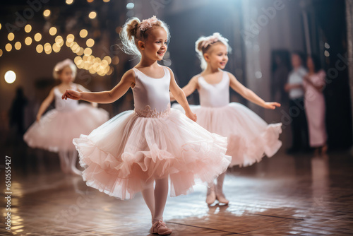 Cute ballerina girls in tutu dance practice in the room