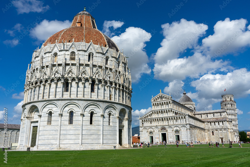 piazza dei miracoli with leaning tower in pisa	and blue sky