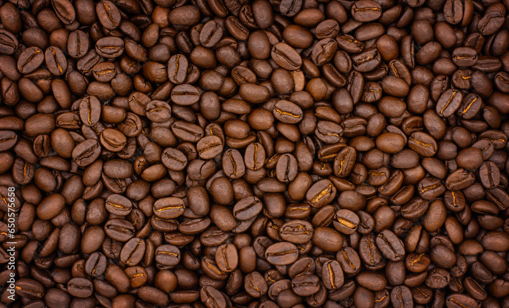 Obraz premium Roasted coffee beans background, close-up top view