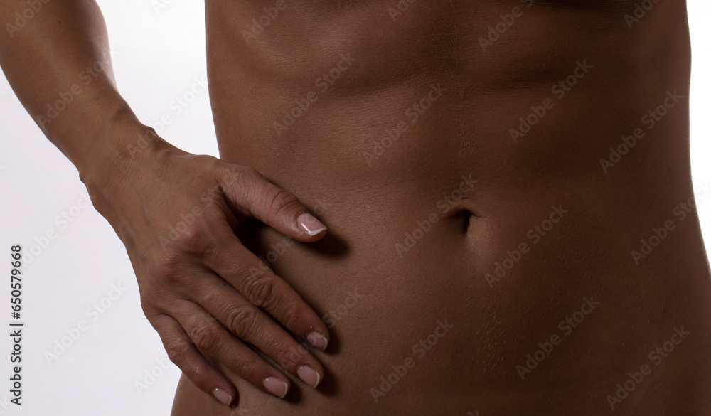 Woman holding hands on a belly. Stomach health concept