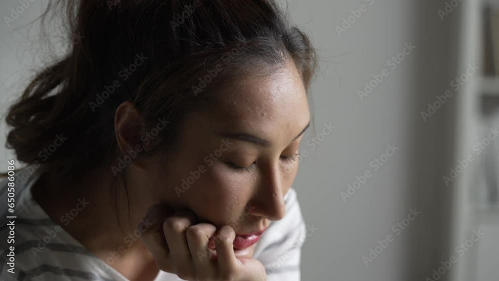Young Asian woman feeling sad tired and worried suffering depression in mental health. Young Asian woman feeling sad tired and worried suffering depression in mental health.