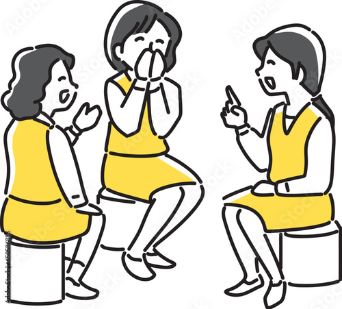楽しく会話する三人の女性