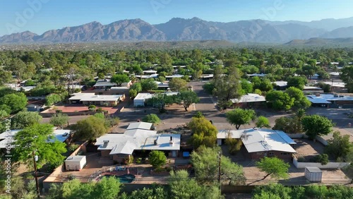 Neighborhood in Arizona. Aerial truck shot above houses and homes with desert landscape. photo
