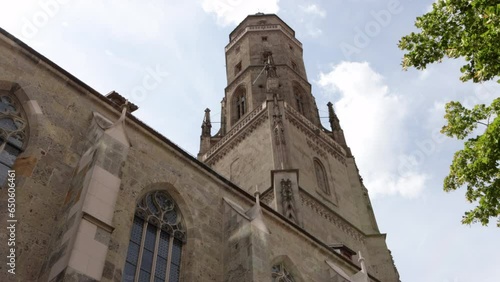 A View Of St. George's Church With Tower Daniel In Nördlingen, Bavaria, Germany. Low Angle photo