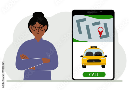 A woman next to a large smartphone on the screen which has a taxi and geolocation. The concept of a mobile taxi application or ordering a taxi online.