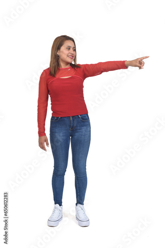 full portait of woman pointing to the side on white background