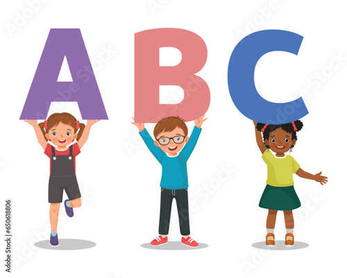 Group of kids student holding giant alphabet letters ABC