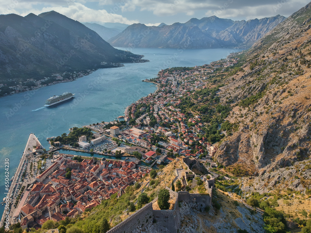 Aerial view on town of Kotor and its Fortress, with sorrounding mountains and bay