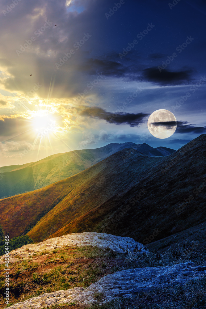 mountain landscape with stones among the grass on top of the hill under the cloudy summer sky with sun and moon at twilight. day and night time change concept. mysterious scenery in morning light
