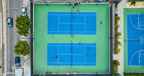 Aerial over Margaret S Hayward Tennis Courts with people playing