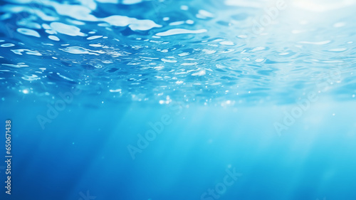 Beautiful blurred natural blue background with water © Yuwarin