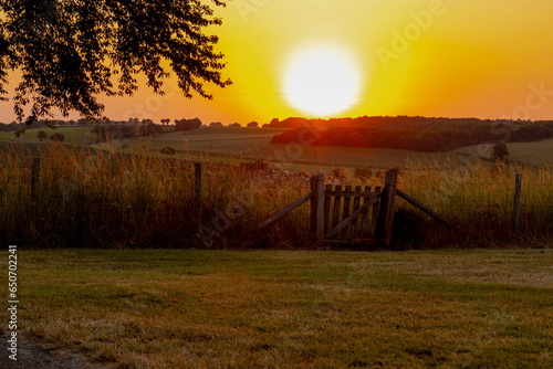 Summer landscape  The terrain hill countryside in Zuid-Limburg  Small houses on hillside in the evening during sunset  Gulpen-Wittem is a villages in Dutch province of Limburg  Gulperberg  Netherlands