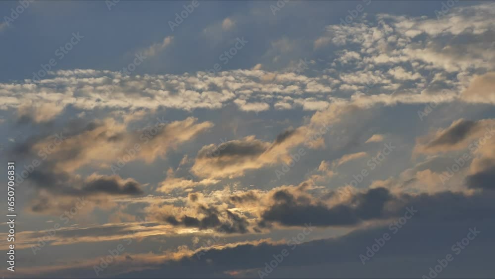 Morning sky, sun rays and moving white orange and blue clouds at different altitudes in atmosphere during sunrise over horizon with chimney - timelapse. Topics: weather, meteorology, dawn Morning sky, sun rays and moving white orange and blue clouds at different altitudes in atmosphere during sunrise over horizon with chimney - timelapse. Topics: weather, meteorology, dawn