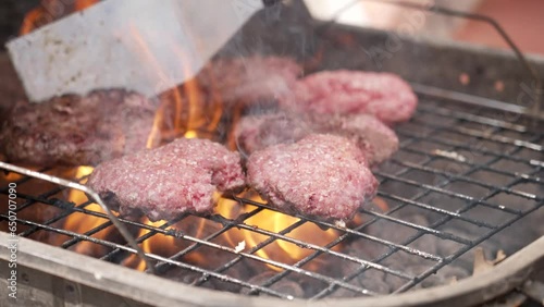Grilling burgers at tailgate 