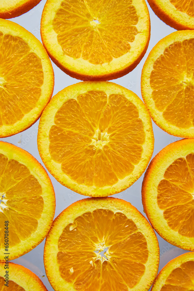 Close up of orange slices on white background Close up of orange slices on white background