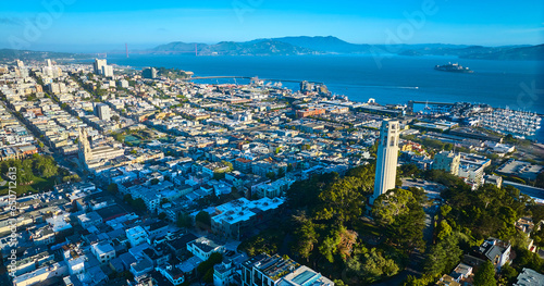 Aerial of Coit Tower with Alcatraz Island in San Francisco Bay and Golden Gate Bridge