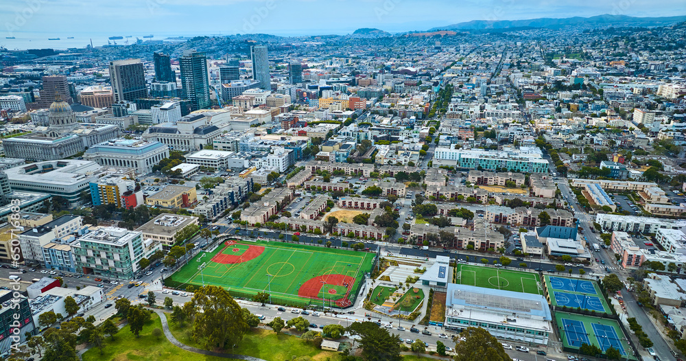 Aerial San Francisco city with close view of multiple sport parks