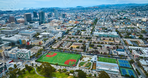 Aerial San Francisco city with close view of multiple sport parks